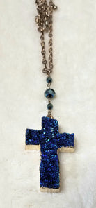 Gold necklace with blue cross