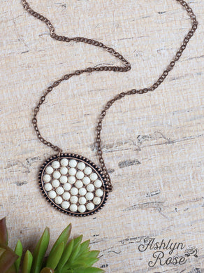BUMPILY BAMBOOZLED BRONZE NECKLACE WITH A CREAM PENDANT 02461